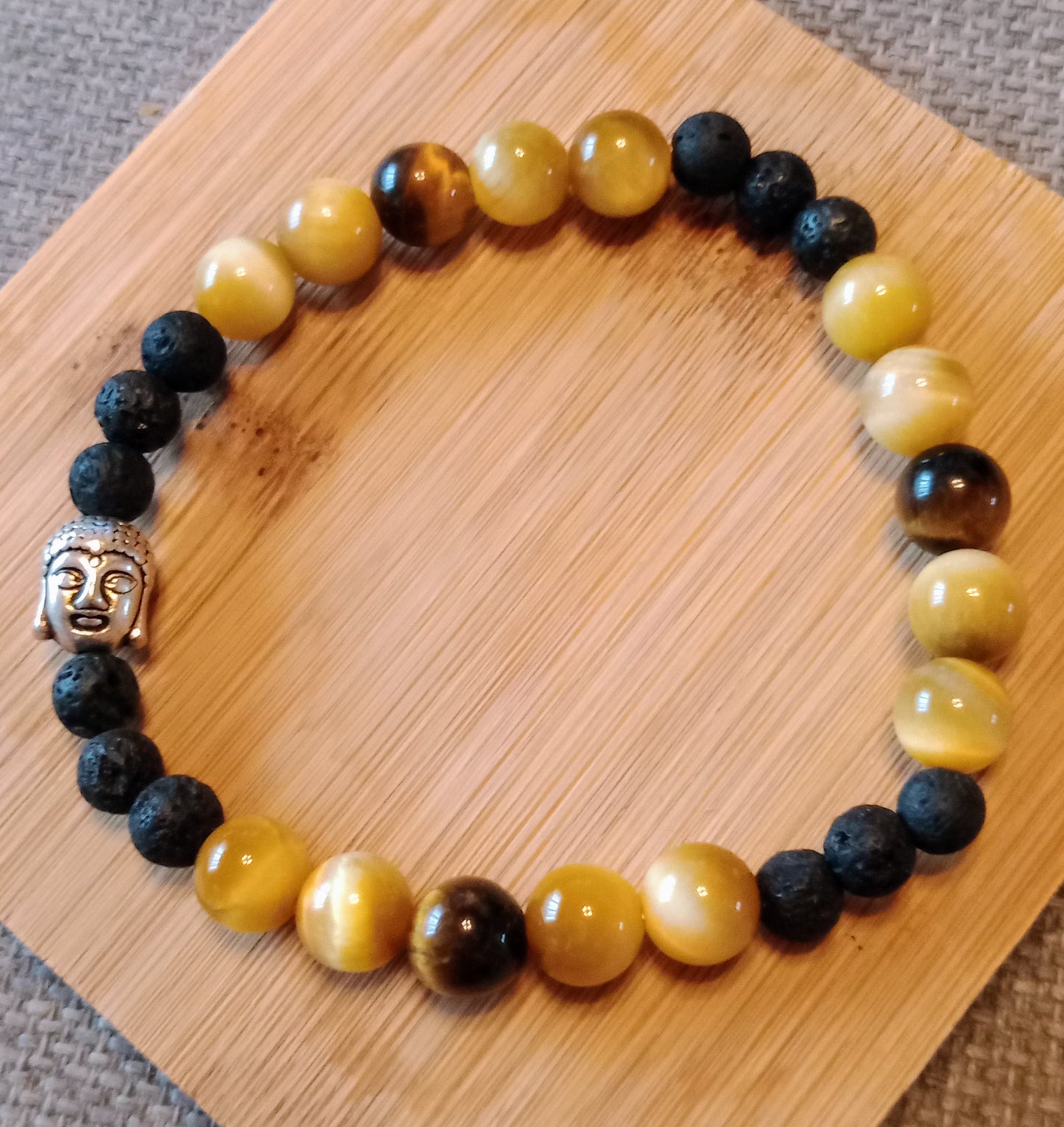 Bracelet pierre de lave et oeil de tigre jaune Bouddha