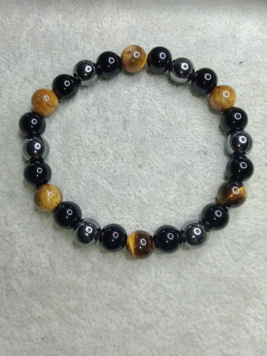 Bracelet triple protection (oeil de tigre, onyx et hématite)